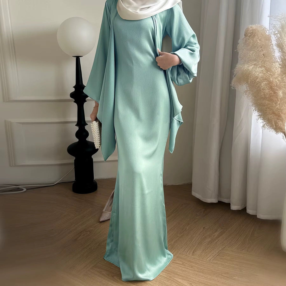 Model wearing the Anabia Dress Set – a modest, flowy two-piece outfit available in New Zealand at Hijabaan