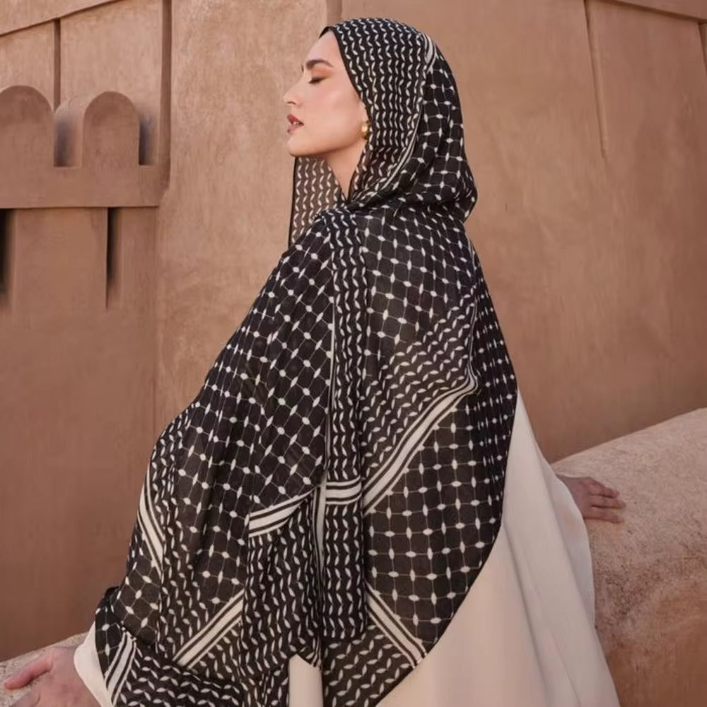 Bold black keffiyeh modal hijab paired with abaya, symbolizing cultural identity – Hijabaan NZ
