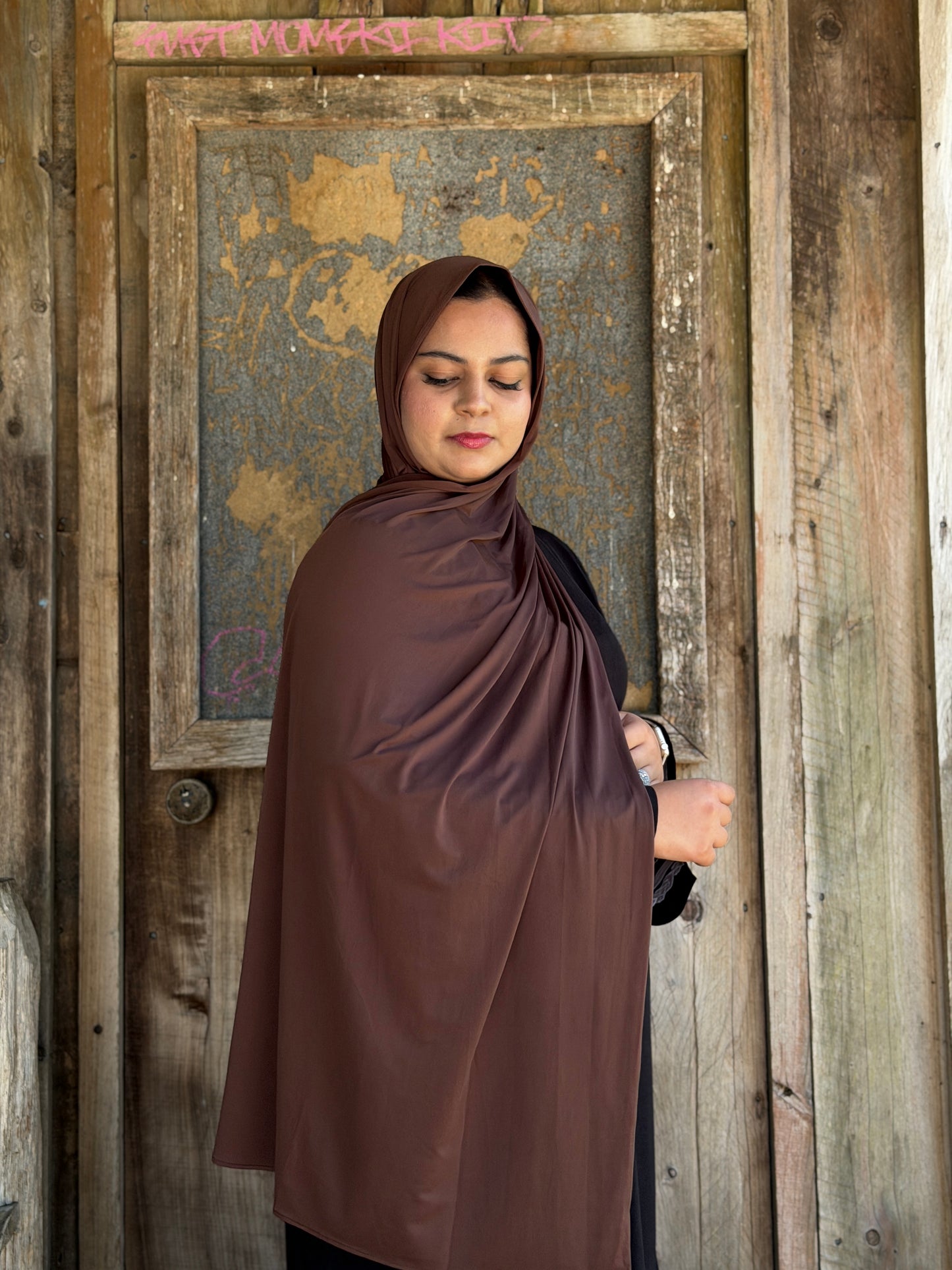 Liquid jersey hijab in dark brown shade, stretchy wrinkle-free fabric ideal for summer modest wear