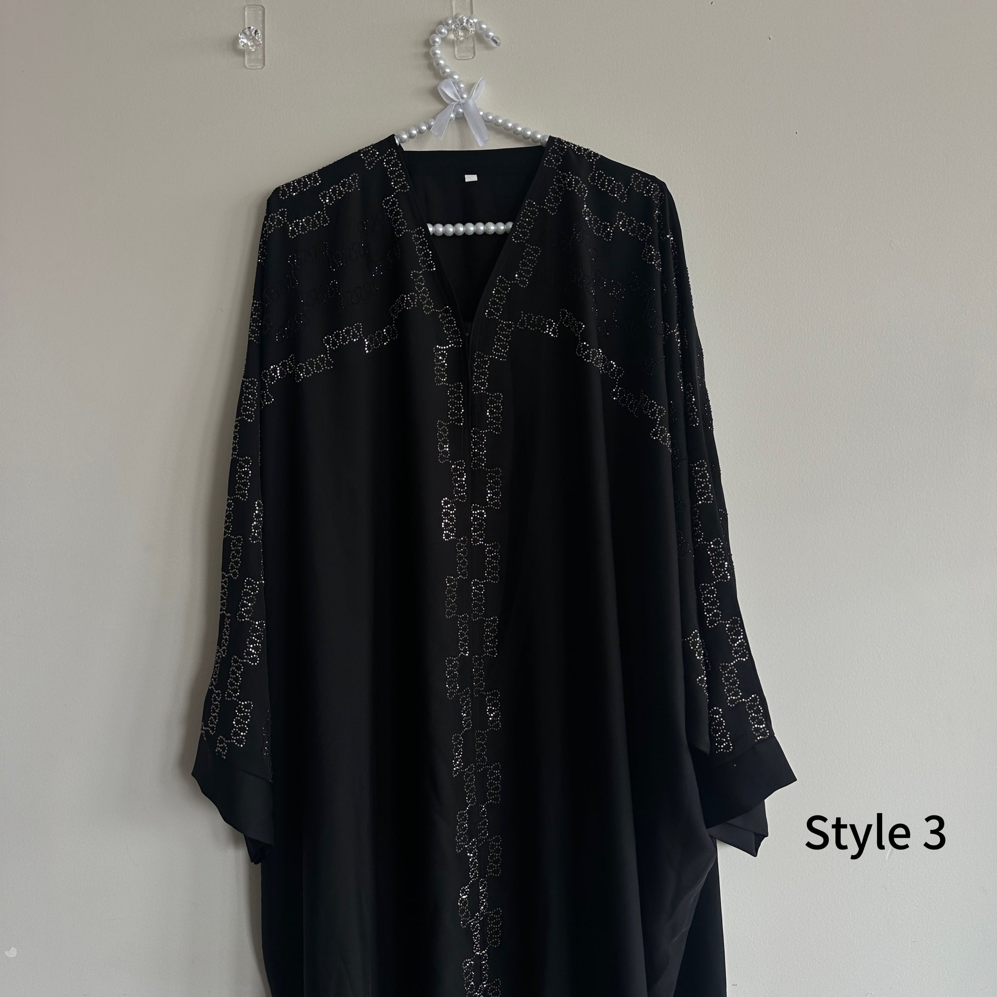 Close-up of diamond hand-embellished detailing on Noir Abaya – Hijabaan NZ