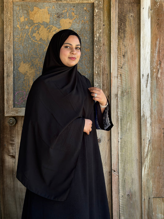 Luxury black chiffon hijab with ultra-soft fabric and refined shine for modest wear