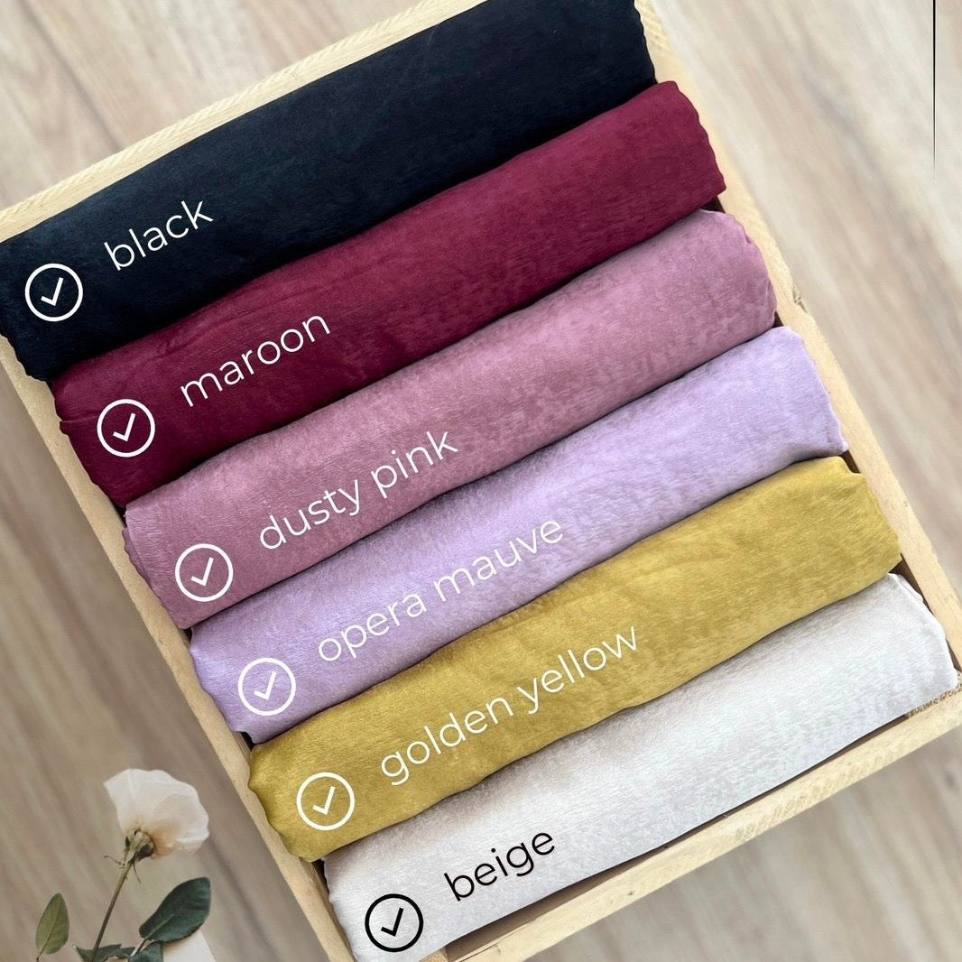 Close-up of luxurious satin velvet hijab fabric for modest wear