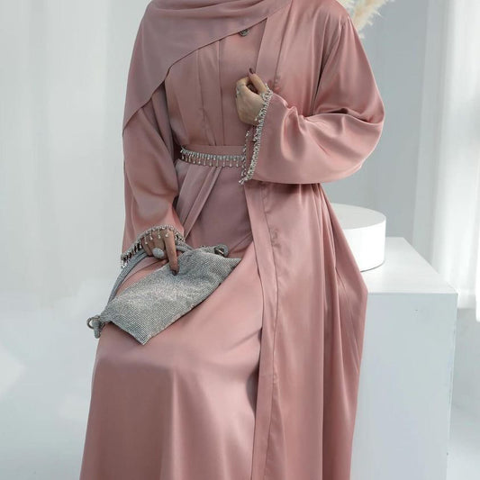 Model wearing Amira Abaya with matching hijab, belt, and shrug – made from luxurious Armani silk
