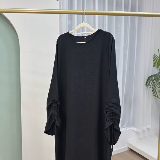 black arwa abaya with elegant knotted sleeve design hijabaan new zealand