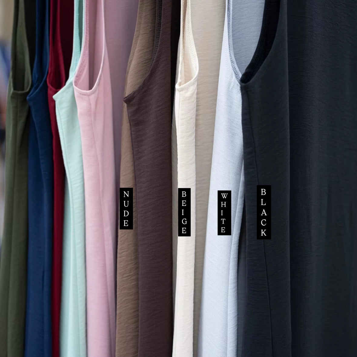 Close-up of CEY Crush fabric on sleeveless slip dress – premium modestwear layering piece from Hijabaan NZ