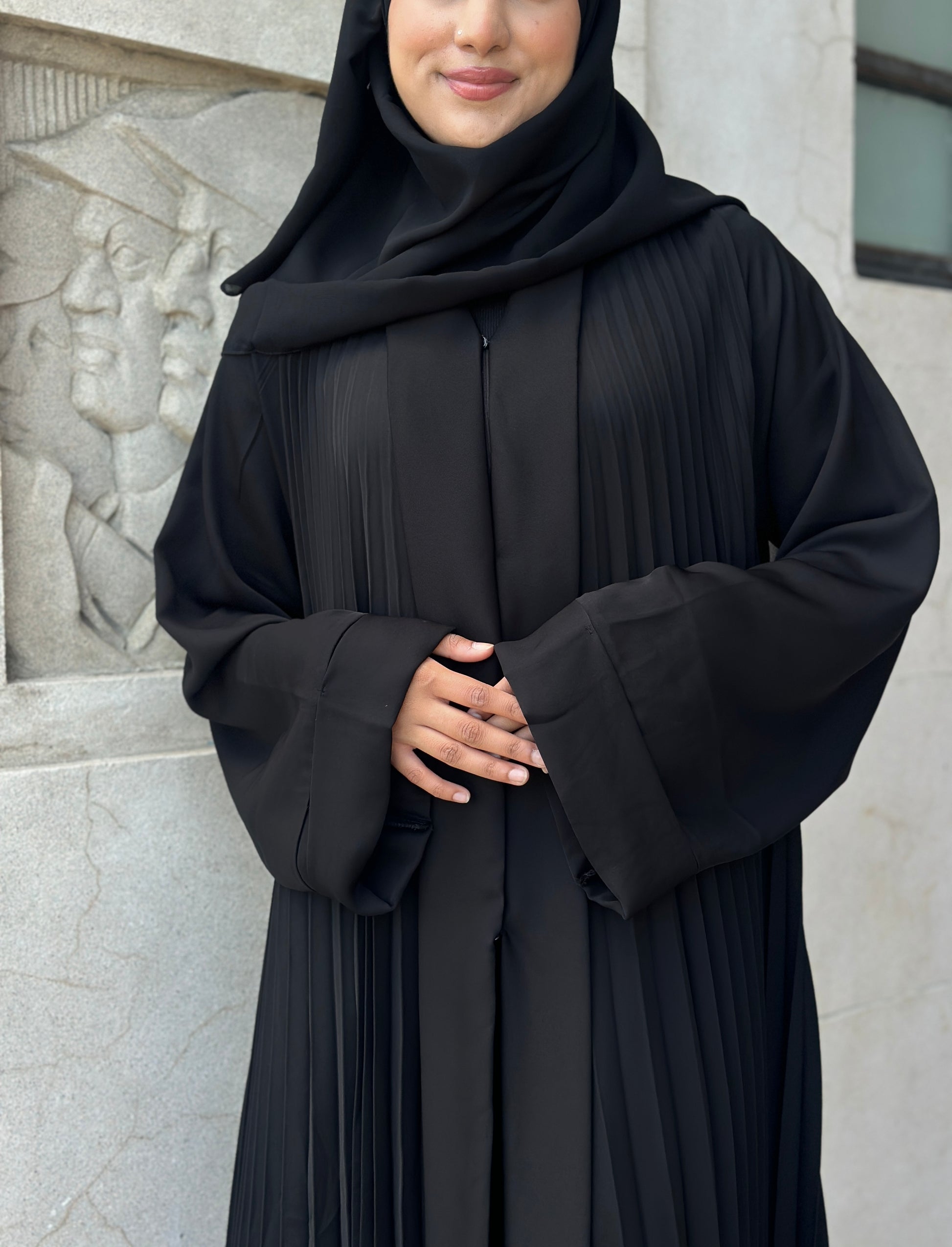 Elegant pleated black abaya Imaan with matching hijab – modest wear NZ