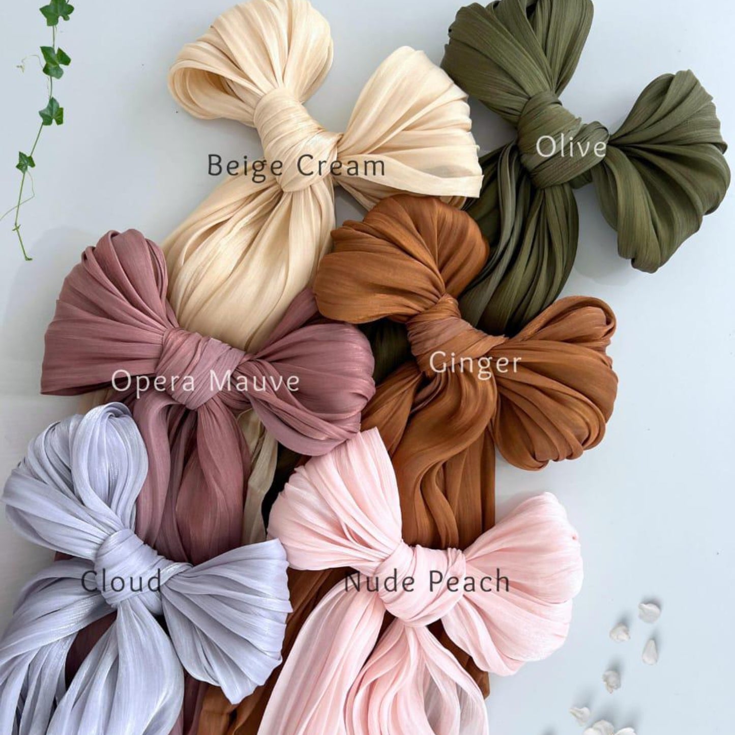 Organza hijab styled for high-volume and structured formal looks