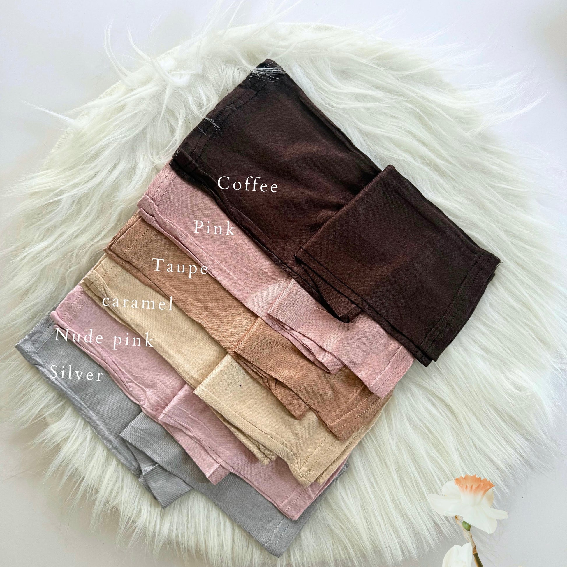 Stretch-fit sleeve accessory shown flat – breathable modest wear from Hijabaan

