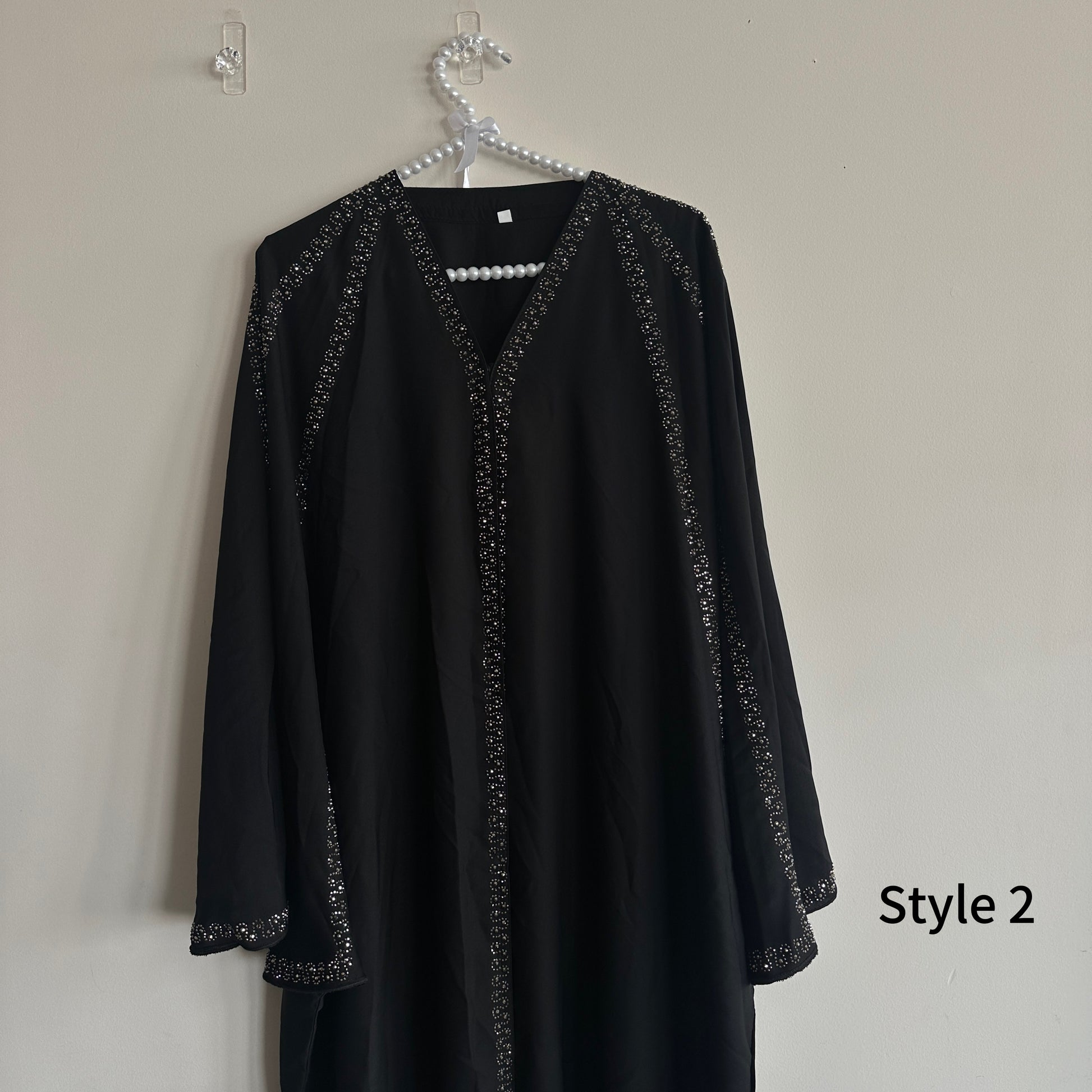 Back view of Noir Abaya – flowy kaftan silhouette from Hijabaan NZ