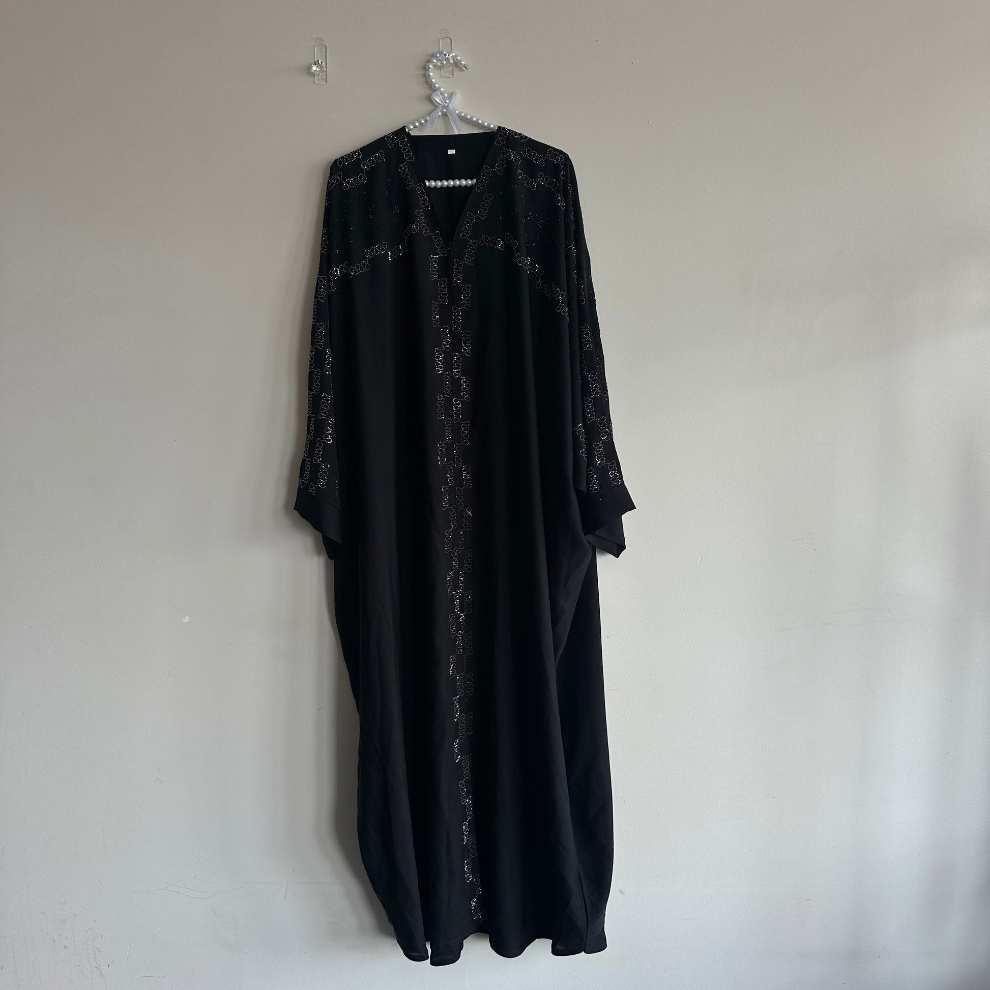 Noir Abaya and matching hijab flatlay – Hijabaan NZ modest outfit