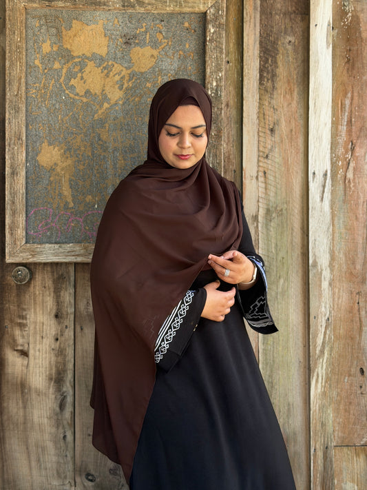Luxury dark brown chiffon hijab with ultra-soft fabric and refined shine for modest wear
