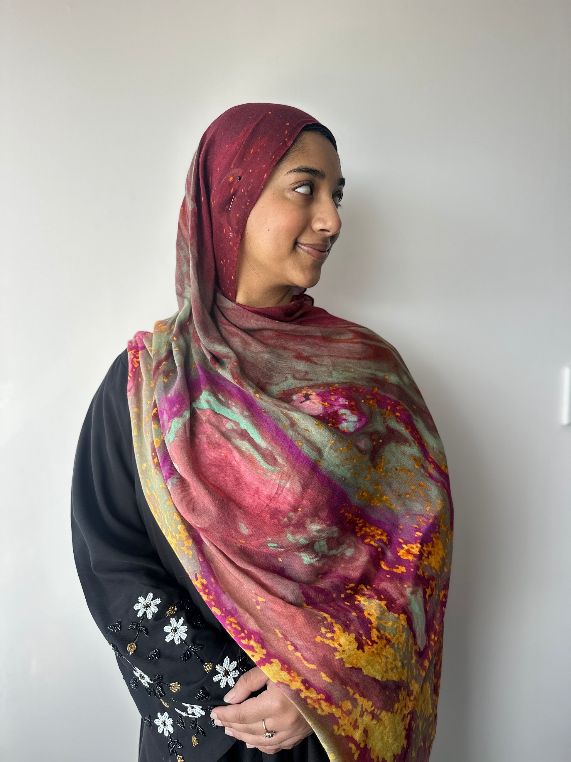 Autumn Flame printed modal hijab – styling view showing elegant drape, Hijabaan Auckland