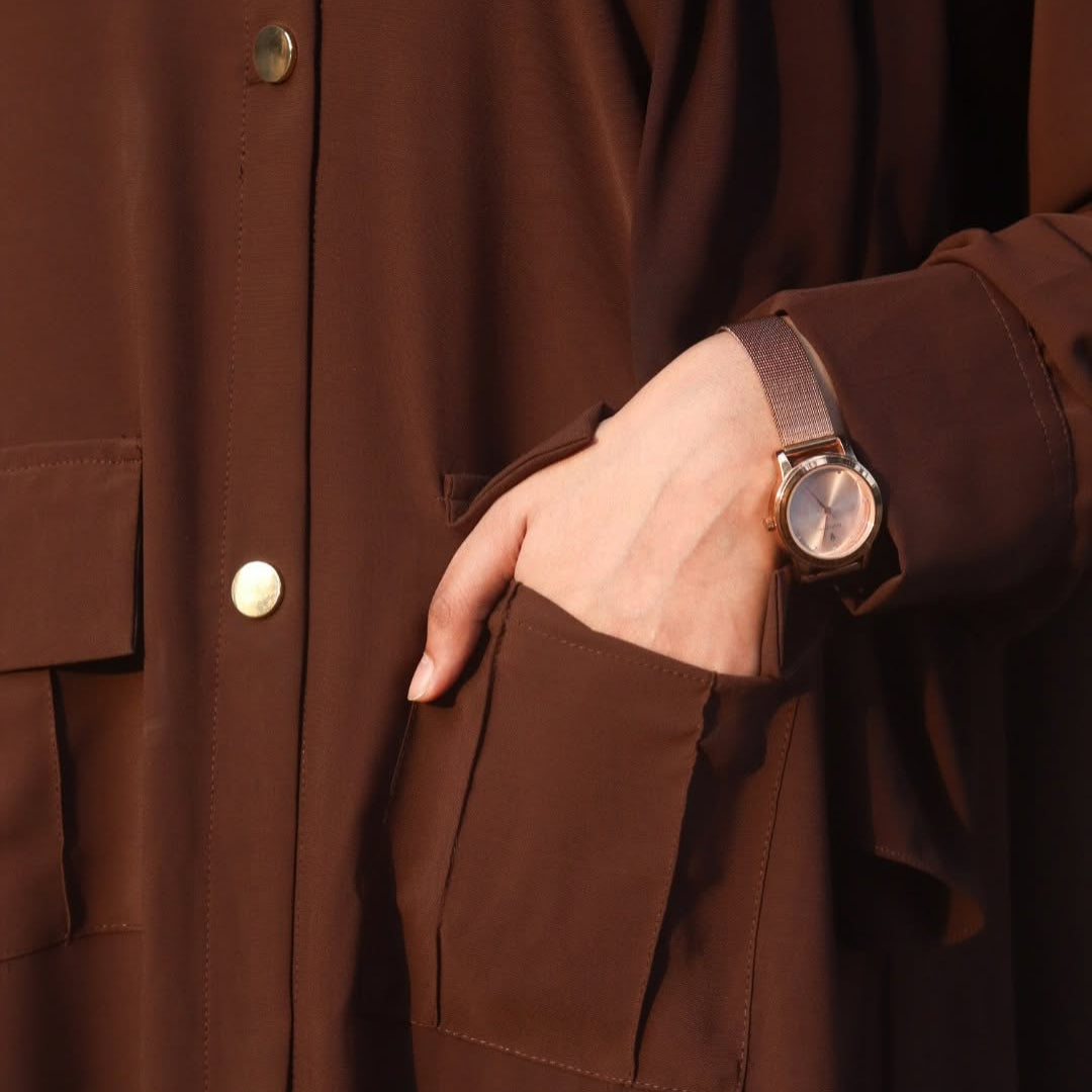 Casual modest outfit featuring shirt-style abaya for everyday wear